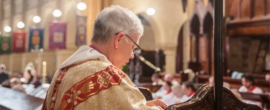 Bishop Peter delivers a message at a church service